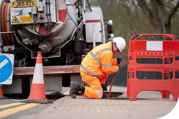 Thames Water engineer working on the street