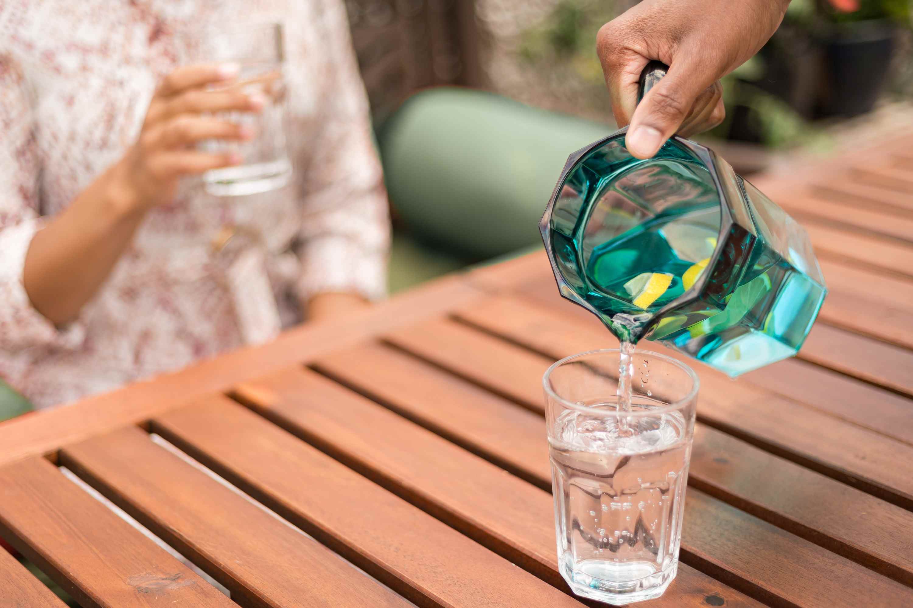 person pouring water