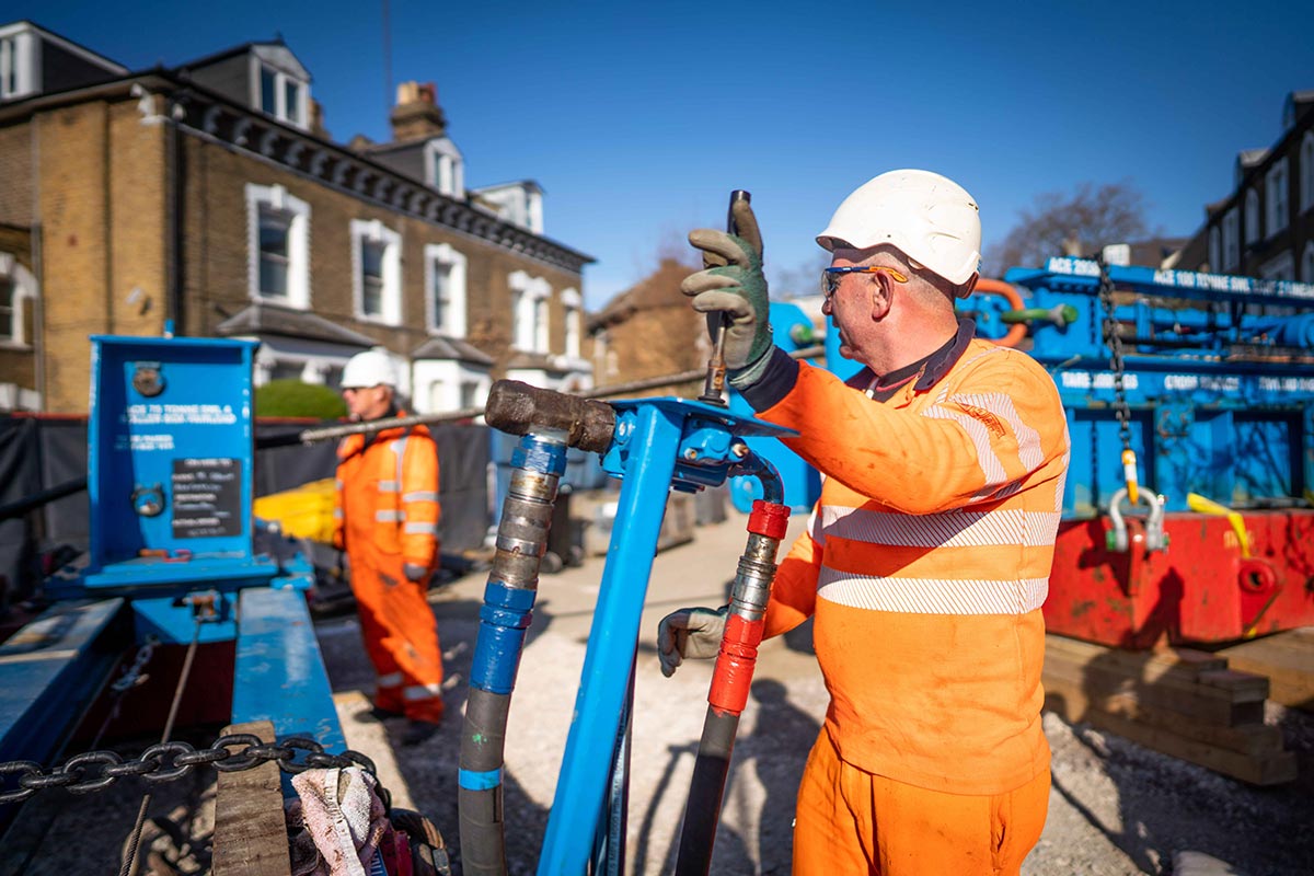 Thames Water engineer works to replace mains pipe