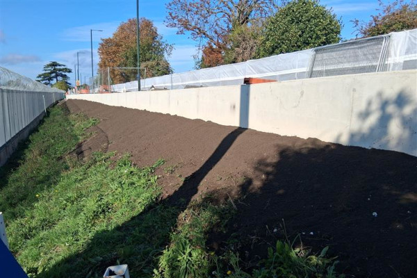 Hampton barrier capping completed