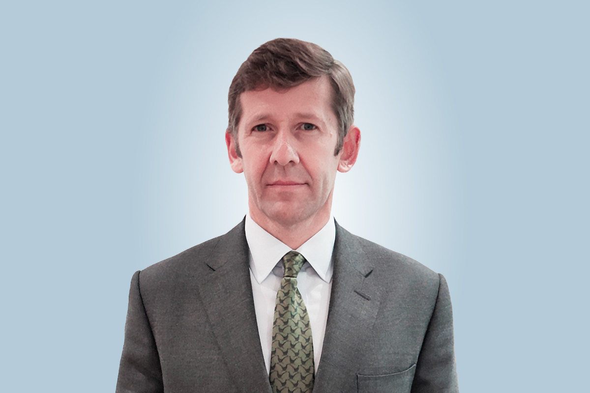 A headshot photo of Aidan de Brunner