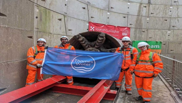 Thames engineers with complete tunnel