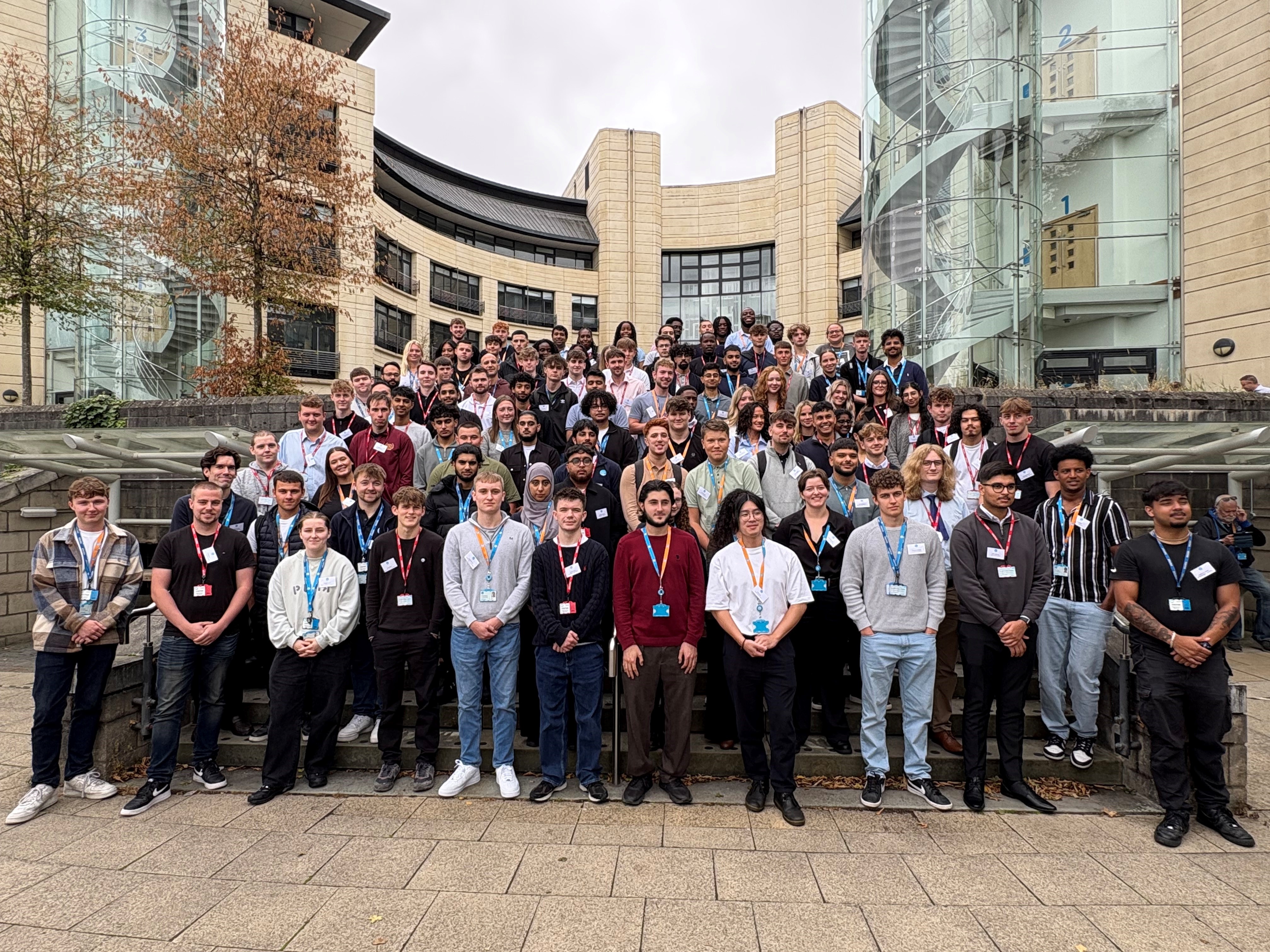 Thames Water 2025 Apprentices, Graduates and Interns stand on steps at Clearwater Court