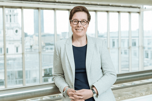 A profile picture of Cathryn Ross with an office window behind her.