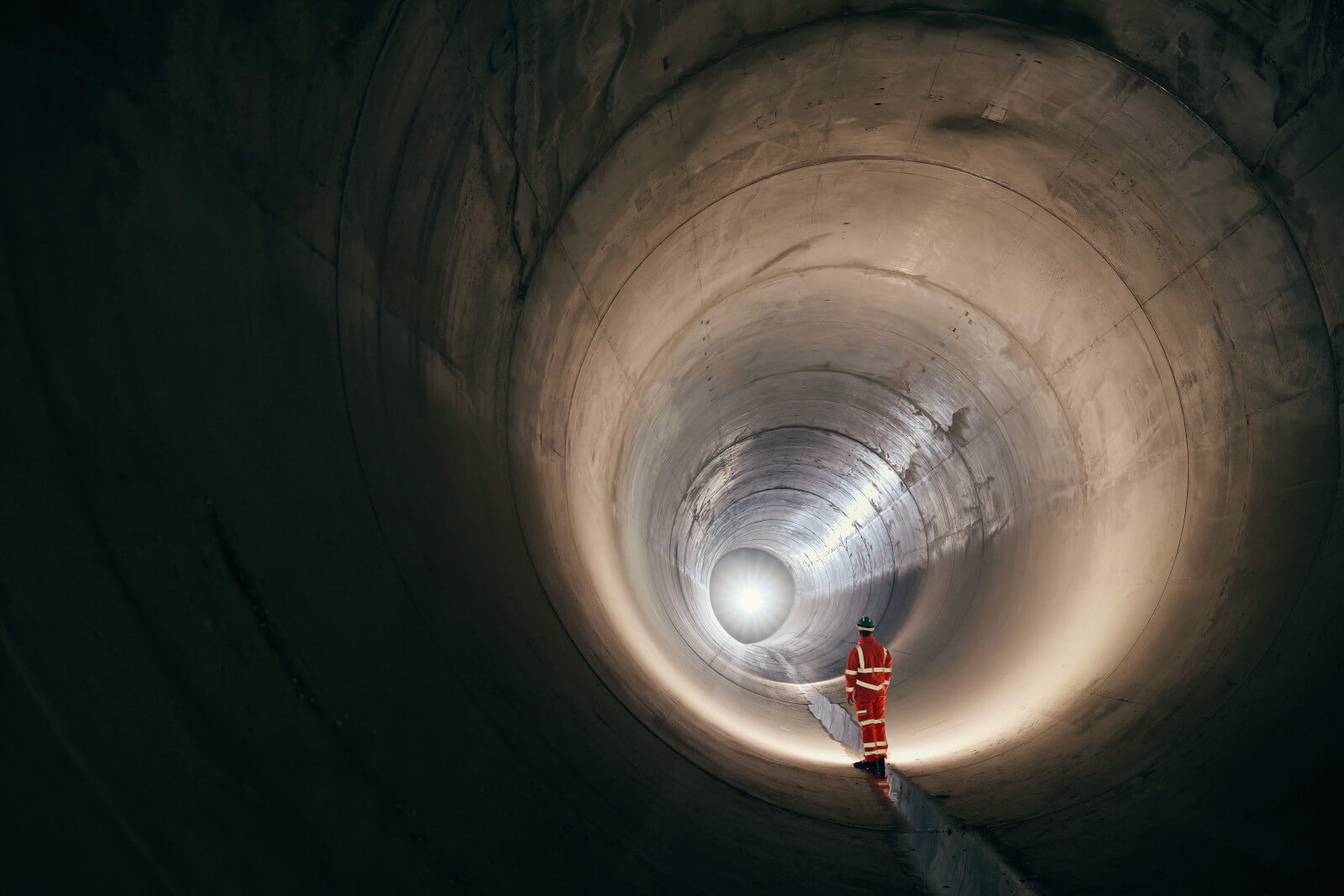 Thames Water engineer standing in the Thames Tideway Tunnel