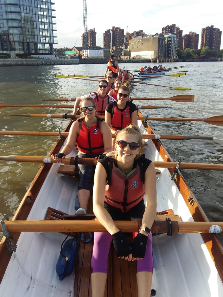 The team of charity rowers on the water
