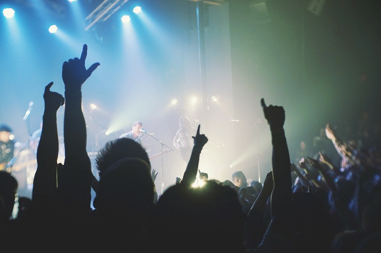 People dancing at a music festival