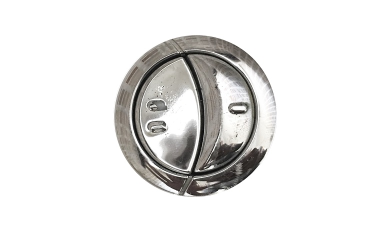 A dual flush button found on toilets
