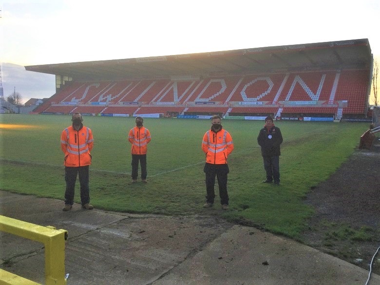 Thames Water plumbers pitchside at Swindon Town Football Club