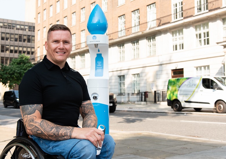 Paralympian David Weir at a Thames Water fountain in London