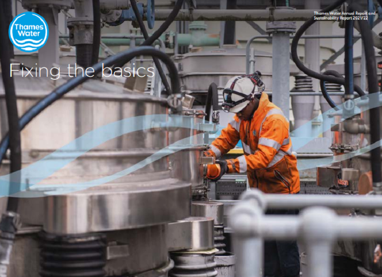 A man in orange high vis fixes a pipe