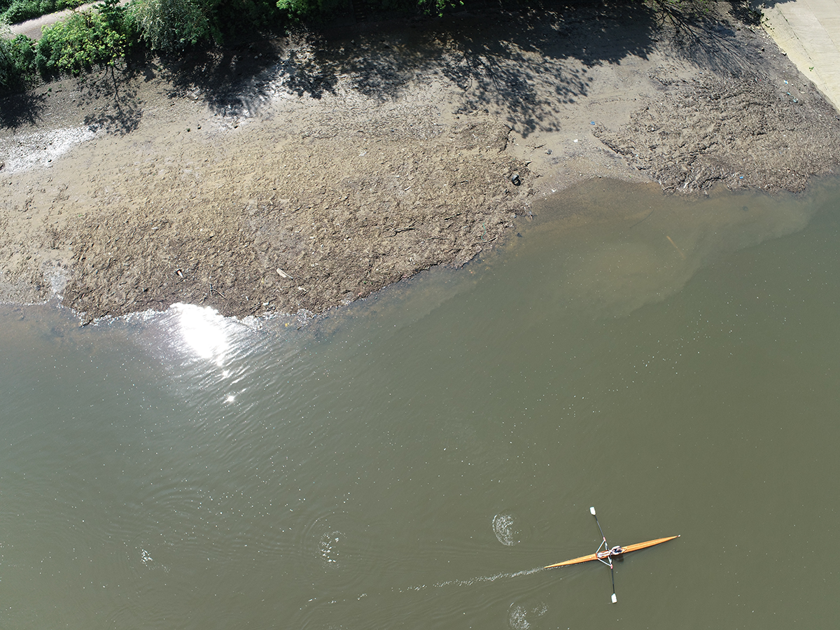 A rower goes past Wet Wipe Island near Hammersmith Bridge. Image courtesy Port of London Authority