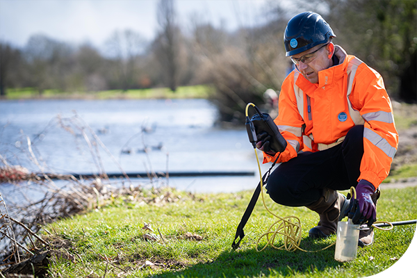 A Thames worker tests the water at a visitor site