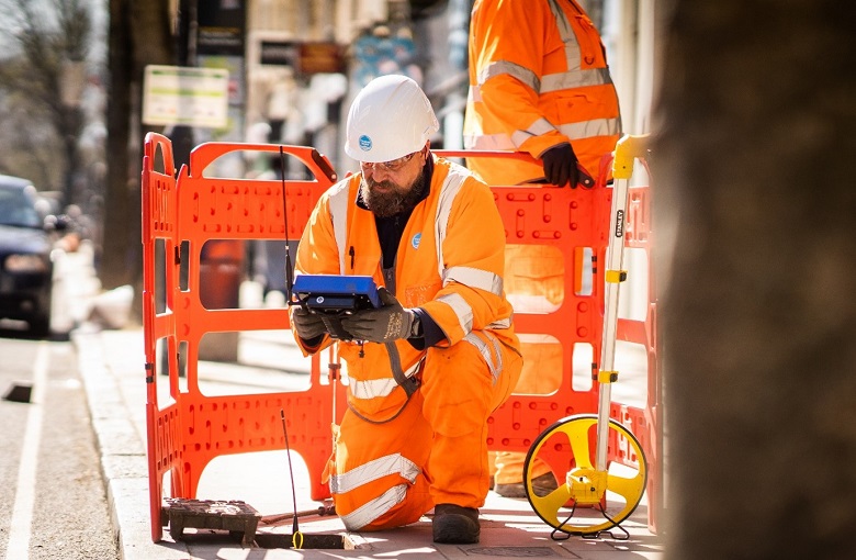 A Thames Water engineer working in the street