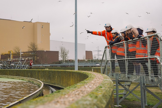 photograph of children on site at a sewage treatment works