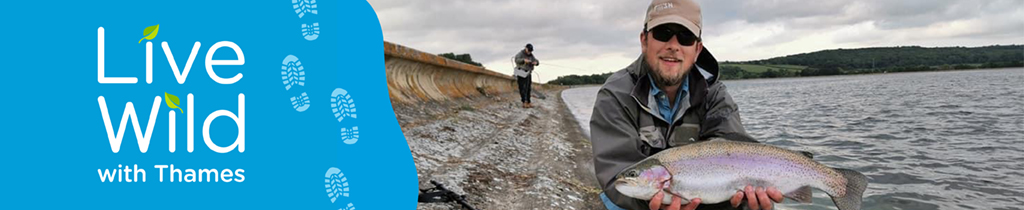 A banner showing a while live wild with thames message on a blue background on the left and a person holding a fish on the right.