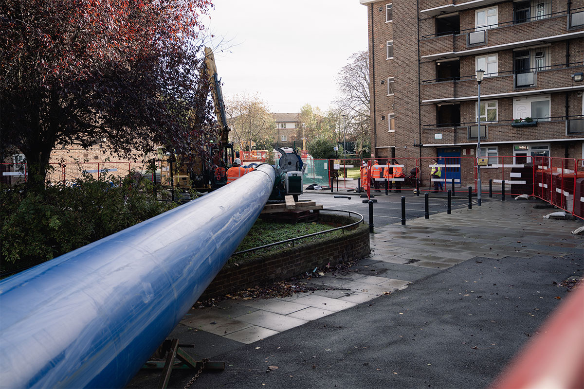 A large pipe running through an estate