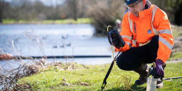 Thames Water engineer testing river water for pollution