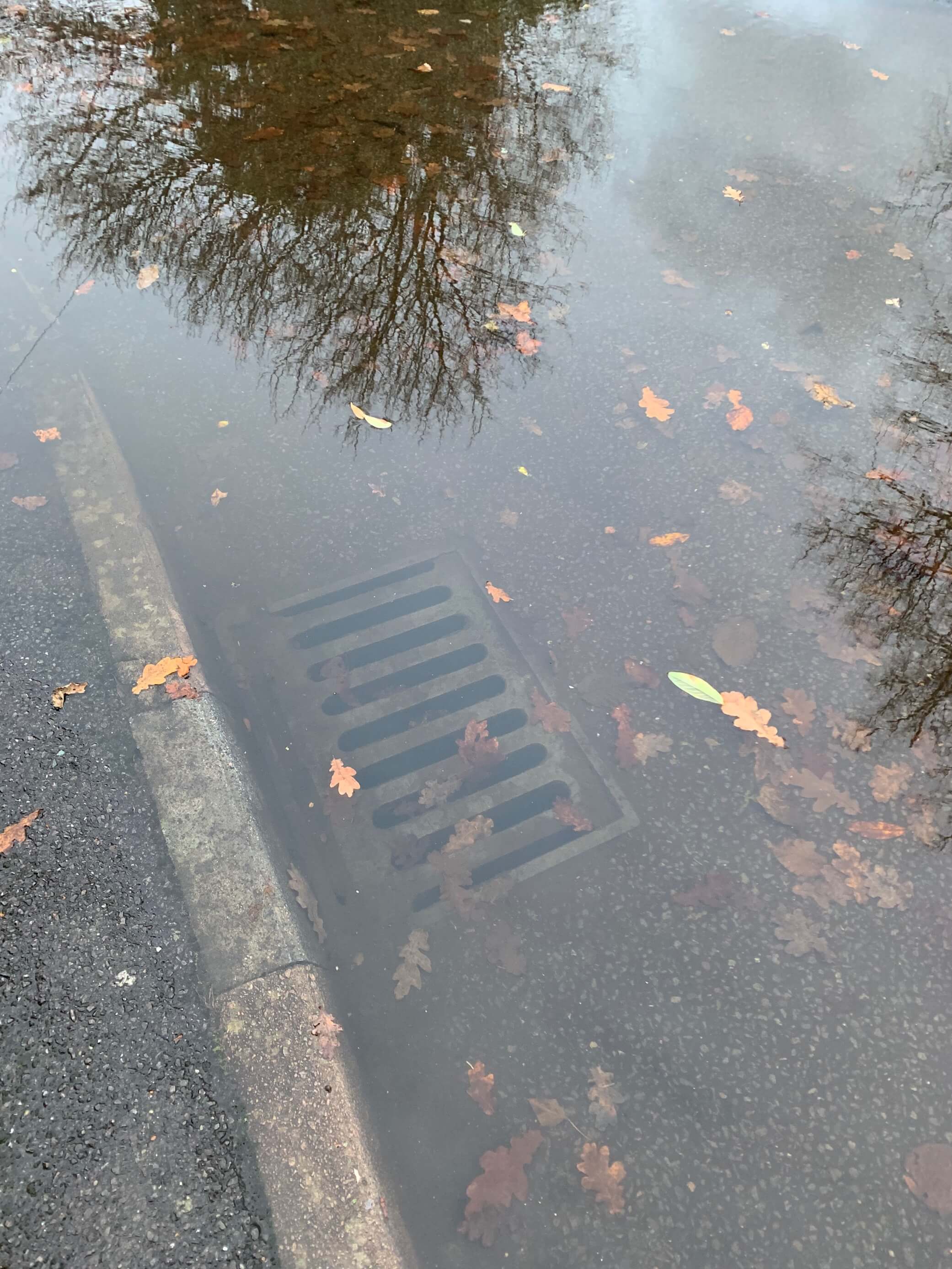 Blocked road gully causing surface-water flooding