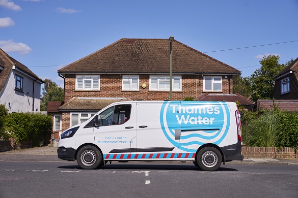 a thames water transit van outside a residential home