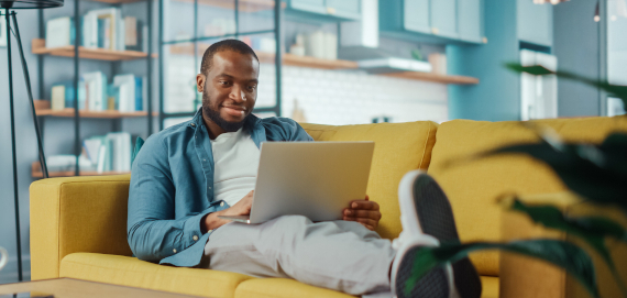 man paying bill online