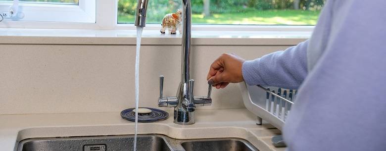 Water flowing from a kitchen tap