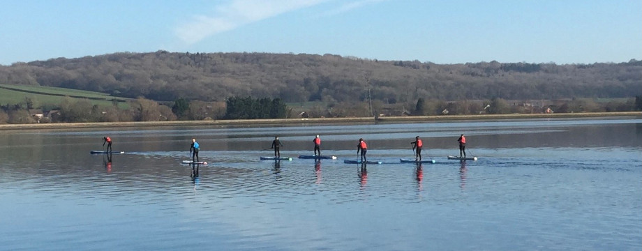 People paddleboarding at Farmoor Reservoir