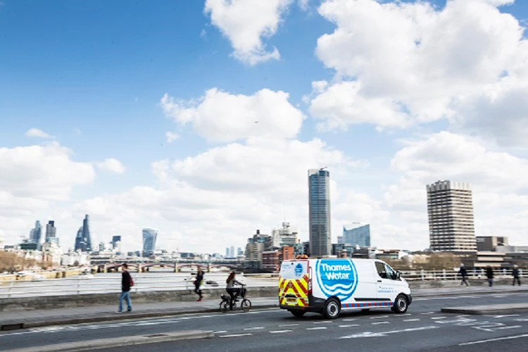 Thames Water van driving on bridge