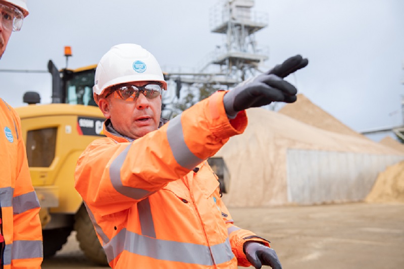 two water engineers working on a site