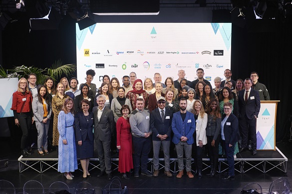 Group of people on stage at an event launch