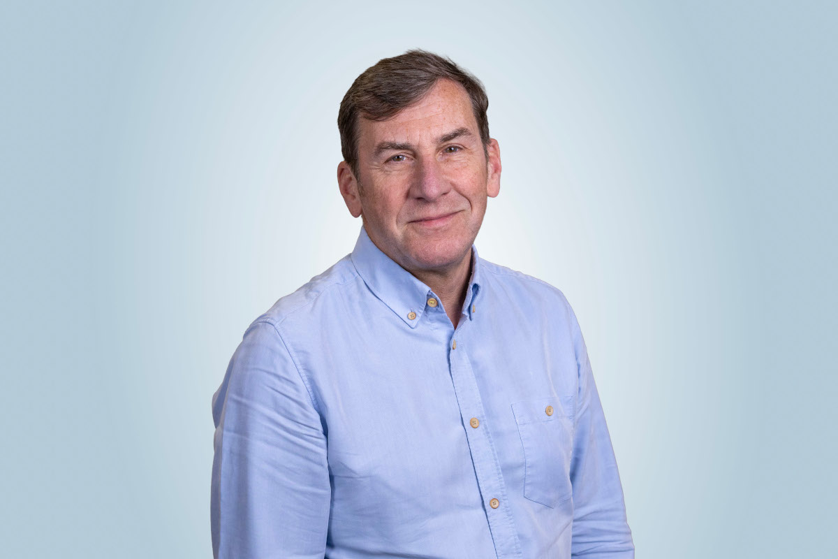 A headshot photo of Andrew McNaughton