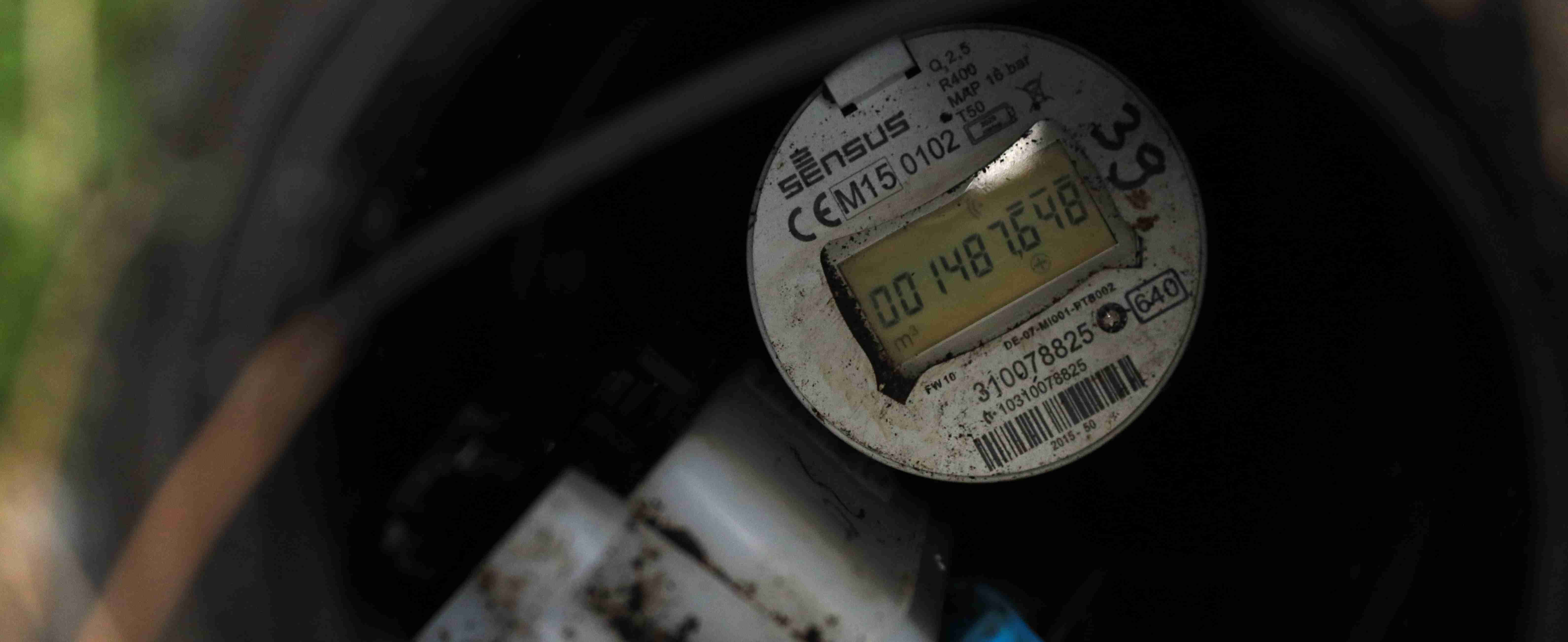 A picture of a digital water meter showing a reading